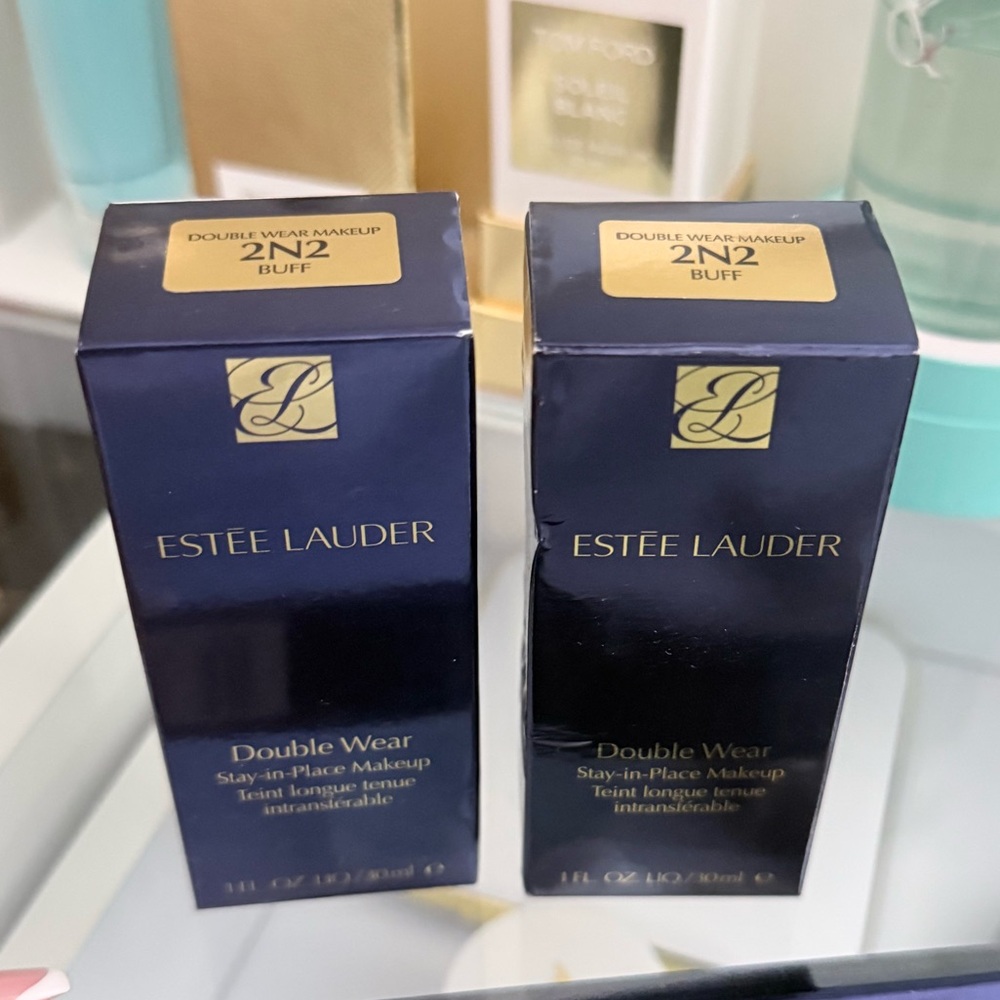 Estee Lauder Double Wear Foundation — 2N2 Buff Beige & Gold Cap. $39 each.